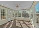 Charming sunroom filled with natural light, offering a serene space to enjoy the outdoors at 2452 Lakebrooke Dr, Marietta, GA 30066
