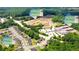 This aerial view showcases phase 1 and 2 of the community's development near schools and lush surroundings at 5417 Flat Rock Pt, Stonecrest, GA 30038