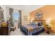 Comfortable bedroom featuring a cozy bed, window, and tasteful decor at 5417 Flat Rock Pt, Stonecrest, GA 30038