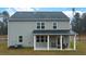 Well-maintained home with a covered patio and generous yard, offering a serene retreat at 5417 Flat Rock Pt, Stonecrest, GA 30038