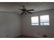 Bedroom with window, fan and great natural light at 661 White Bird Way, Fairburn, GA 30213