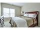 Bedroom with a bed and nightstand next to a window at 251 Vinings Retreat Sw Vw, Mableton, GA 30126