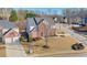 Beautiful red brick house with white trim, situated on a corner lot with well-kept landscaping and mature trees at 251 Vinings Retreat Sw Vw, Mableton, GA 30126