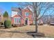 Charming two-story red brick home with landscaped yard at 251 Vinings Retreat Sw Vw, Mableton, GA 30126
