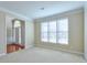 Bright living room with large windows and neutral carpeting at 251 Vinings Retreat Sw Vw, Mableton, GA 30126
