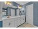 The main bathroom features dual sinks, white cabinets, and modern gold fixtures at 308 Lismore Ter, Woodstock, GA 30189