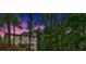 Beautiful two-story home with wooded setting and a deck at 308 Lismore Ter, Woodstock, GA 30189