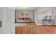 Bright living room with hardwood floors, sofa, and decor on the walls at 308 Lismore Ter, Woodstock, GA 30189
