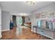Bright room featuring hardwood floors, a vanity table, and decorative accents at 308 Lismore Ter, Woodstock, GA 30189