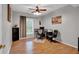 Office space featuring wood floors, a desk, and a chair at 308 Lismore Ter, Woodstock, GA 30189