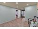 Office room featuring wood floors, and doorway leading to another room at 308 Lismore Ter, Woodstock, GA 30189