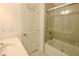 Bathroom featuring a combination shower-tub and vanity with sink at 351 Clay St, Grayson, GA 30017