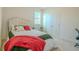 Bright bedroom with a comfortable bed, neutral decor, and a window with shutters at 351 Clay St, Grayson, GA 30017