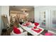 Dining area features a marble table, stylish decor, and an open view of the kitchen at 351 Clay St, Grayson, GA 30017
