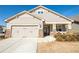 Charming home with a two-car garage, stone accents, and a welcoming front porch at 351 Clay St, Grayson, GA 30017
