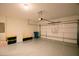 Spacious garage with ample storage and an automatic door system at 351 Clay St, Grayson, GA 30017