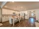 Spacious kitchen with white cabinets, sleek countertops, and a breakfast bar at 351 Clay St, Grayson, GA 30017