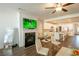 Open-concept living room featuring a fireplace and seamless flow to the kitchen at 351 Clay St, Grayson, GA 30017