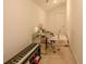 An office space includes a desk, chair, keyboard, and plush floor covering at 351 Clay St, Grayson, GA 30017