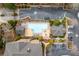 Aerial view of a sparkling pool with lounge chairs surrounded by manicured landscaping and convenient parking at 2300 Peachford Rd # 4004, Atlanta, GA 30338