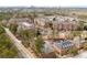 Aerial view of a residential community surrounded by mature trees and offering ample parking for residents at 2300 Peachford Rd # 4004, Atlanta, GA 30338