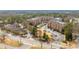 A scenic aerial view of a well-maintained apartment community with lush greenery and ample parking at 2300 Peachford Rd # 4004, Atlanta, GA 30338