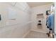 Walk-in closet with wire shelving and neutral walls at 2300 Peachford Rd # 4004, Atlanta, GA 30338