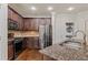Updated kitchen with stainless appliances, granite counters, and convenient in-unit laundry at 2300 Peachford Rd # 4004, Atlanta, GA 30338