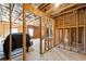 Unfinished basement with exposed wood framing ready for customization and renovation at 3152 Avenel Ct, Snellville, GA 30078