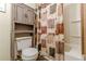 Bathroom featuring a toilet, vanity, and shower/tub combination with coordinated decor at 5255 Post Rd, Winston, GA 30187