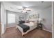 Cozy bedroom featuring a ceiling fan, neutral decor, and plush carpet at 2720 Marlin Dr, Mcdonough, GA 30253