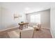 Bright bedroom or office with natural light, plush carpet, and neutral decor at 2720 Marlin Dr, Mcdonough, GA 30253