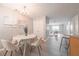 Elegant dining area showcasing a round table, stylish chairs, and easy access to the living space at 2720 Marlin Dr, Mcdonough, GA 30253