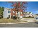 Well-maintained townhomes with neat lawns and mature trees, providing a comfortable neighborhood feel at 2720 Marlin Dr, Mcdonough, GA 30253