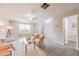 Relaxing living room with a ceiling fan, plush seating, and modern decor at 2720 Marlin Dr, Mcdonough, GA 30253