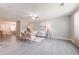 Bright living room featuring stylish, neutral decor and modern flooring, creating a welcoming space at 2720 Marlin Dr, Mcdonough, GA 30253