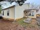 Backyard view with newly constructed garden boxes and mature trees surrounding the property at 3465 Jones Ferry Ln, Alpharetta, GA 30022