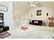 Loft area with furniture, including a black futon and a pink chair at 3465 Jones Ferry Ln, Alpharetta, GA 30022