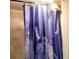 Bathroom with a unique galaxy-themed shower curtain at 571 Grant Sw St, Atlanta, GA 30315