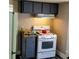 Kitchen featuring an electric stove and some storage space at 571 Grant Sw St, Atlanta, GA 30315