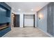 Large open bedroom featuring a fireplace, closet, accent lighting, and wood laminate flooring at 8 Cantey Nw Pl, Atlanta, GA 30327