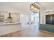 Open-concept space showcasing a kitchen island with bar seating, natural light and modern design at 8 Cantey Nw Pl, Atlanta, GA 30327