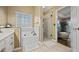 Spacious bathroom featuring a soaking tub, glass shower, and bright natural light at 129 Windy Cir, Mcdonough, GA 30253