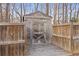 Wooden shed with fencing in backyard at 129 Windy Cir, Mcdonough, GA 30253