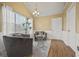 Cozy sitting area with comfortable armchairs, soft lighting, and a view to the outside at 129 Windy Cir, Mcdonough, GA 30253