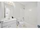 Clean bathroom featuring a shower/tub combo and a white vanity sink at 2740 Woodbine Hill Way, Norcross, GA 30071