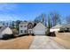 Charming exterior view of home showing the architectural details and landscape at 2740 Woodbine Hill Way, Norcross, GA 30071