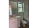 Bathroom featuring a vanity with sink, a toilet, and a shower-tub combination at 3076 Zodiac Ct, Lawrenceville, GA 30044