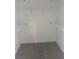 Interior view of a walk-in closet with ample shelving and plush carpeting at 3076 Zodiac Ct, Lawrenceville, GA 30044
