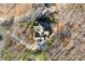 Aerial view of the house showing the roof, driveway, and surrounding trees, highlighting the property's setting at 4411 Windsor Oaks Cir, Marietta, GA 30066